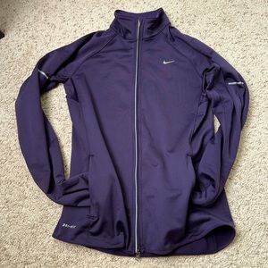 Purple Nike size medium zip up dry fit with zip up pockets